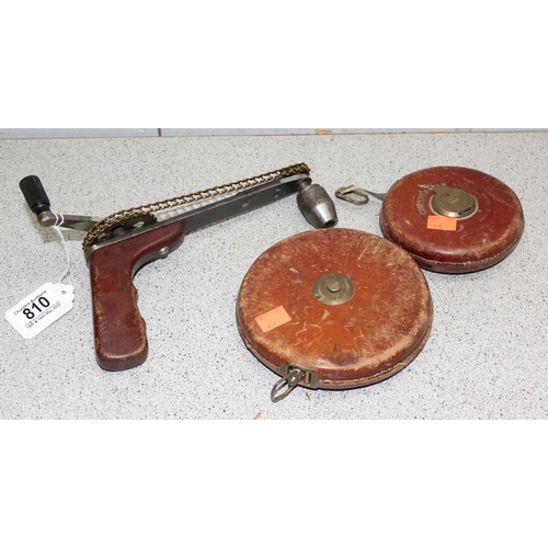 810 - An unusual drill and 2 vintage leather cased tape measures