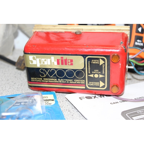 819 - 2 Foxwell error code readers and a number of other motoring parts