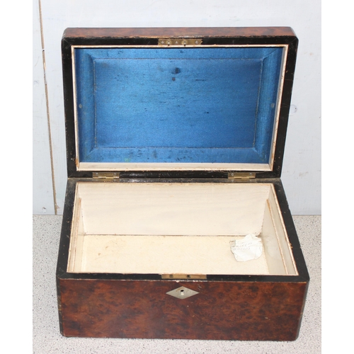 283 - An antique burrwood box with mother of pearl inlay