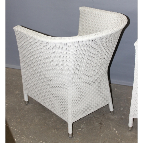 96 - A pair of white painted woven armchairs