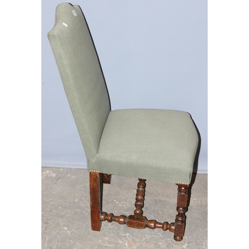 104 - A pair of Georgian style green upholstered high back chairs with turned legs, approx 105cm tall