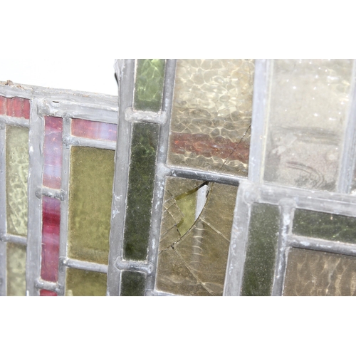 465 - 12 assorted antique and vintage leaded stained glass window panels, various sizes and designs