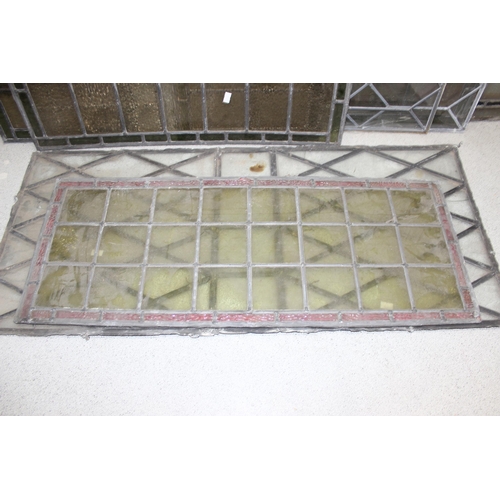 465 - 12 assorted antique and vintage leaded stained glass window panels, various sizes and designs