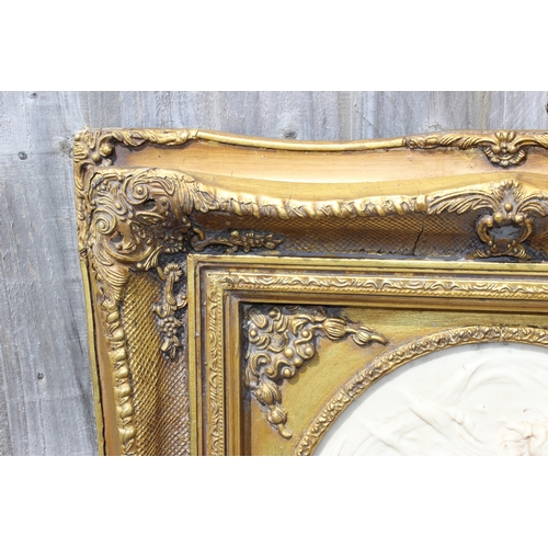 470 - A Continental gilt framed pier view mirror, the moulded frame with foliate corners above the frieze ... 