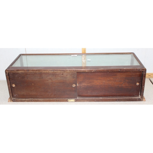 124 - An early 20th century square glazed table top display case by Bretherion & Son, ideal for antiques f... 