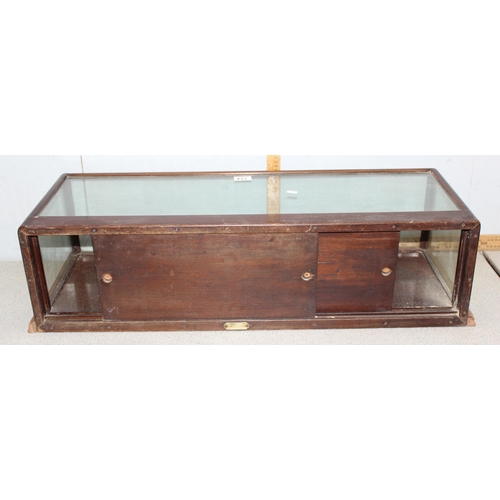 124 - An early 20th century square glazed table top display case by Bretherion & Son, ideal for antiques f... 