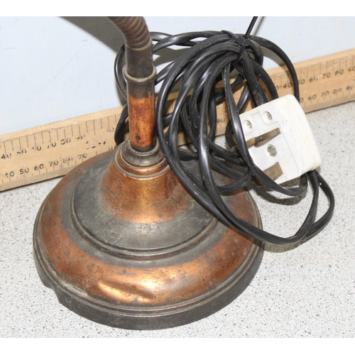 267 - An early 20th century adjustable desk lamp with copper and cast iron base