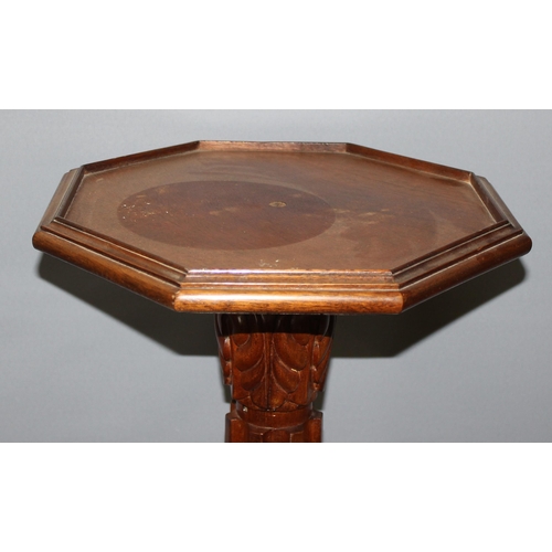 133 - A vintage carved wooden torchiere stand with octagonal top, approx 153cm tall