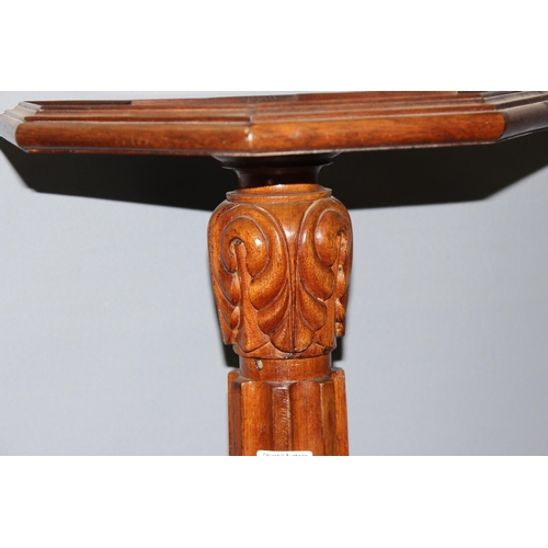 133 - A vintage carved wooden torchiere stand with octagonal top, approx 153cm tall