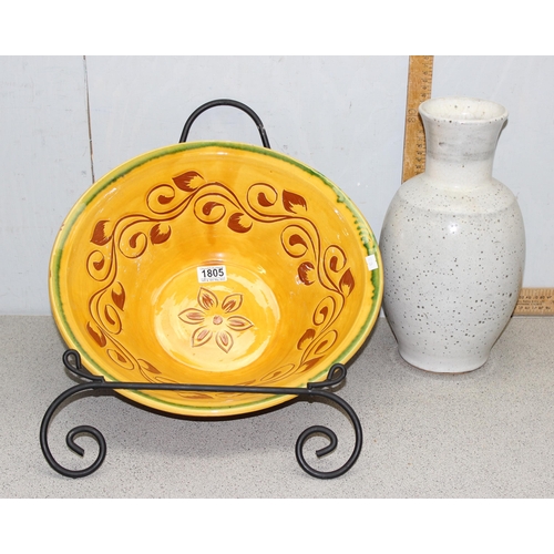 1805 - A large decorative terracotta bowl marked Zafra on iron stand and an indistinctly signed Art Pottery... 