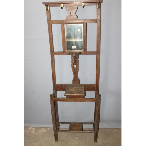 139 - Vintage oak hall stand with bevelled mirror, approx 170cm high