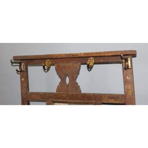 139 - Vintage oak hall stand with bevelled mirror, approx 170cm high