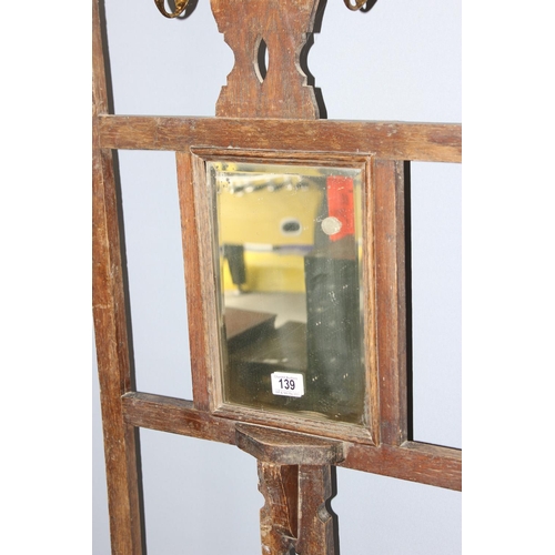 139 - Vintage oak hall stand with bevelled mirror, approx 170cm high