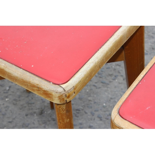 141 - Set of five retro light wood & red seated leatherette stools by Stoe, approx 57cm tall