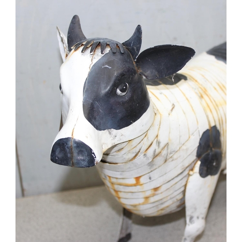 314 - A vintage style metal garden model of a cow, approx 49cm nose to tail