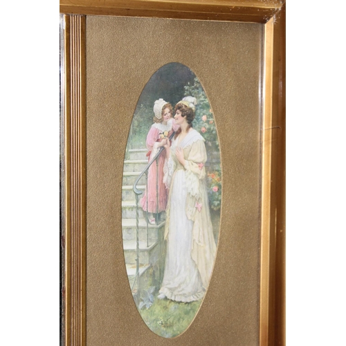 499G - A late 19th or early 20th century gilt framed bevelled edge mirror flanked by 2 oval prints of ladie... 