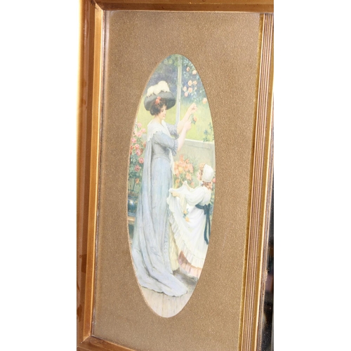 499G - A late 19th or early 20th century gilt framed bevelled edge mirror flanked by 2 oval prints of ladie... 