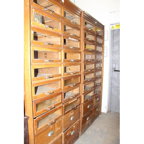 7 - A pair of early 20th Century haberdashery shop fitters display cabinet with plaque for 'J.C. King Lt... 