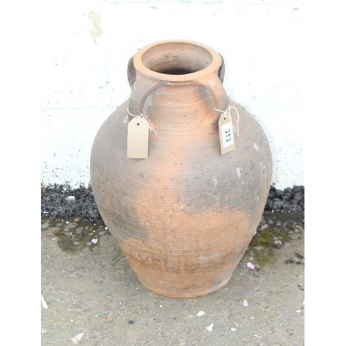 313 - A vintage 2 handled terracotta urn, approx 43cm tall