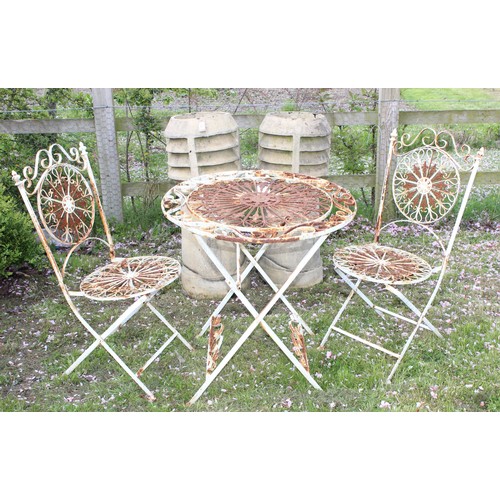 308 - A vintage folding metal bistro table set and 2 chairs, the table approx 71cm in diameter