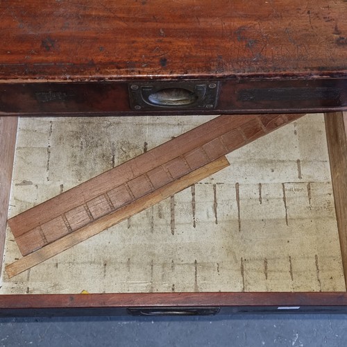 5 - A late Victorian mahogany haberdashery shop bank of fourteen drawers, each graduated drawer with flu... 