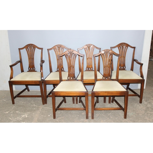 12 - A set of 6 Hepplewhite style dining chairs with carved wheatsheaf motifs