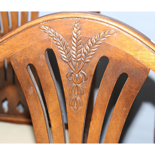 12 - A set of 6 Hepplewhite style dining chairs with carved wheatsheaf motifs