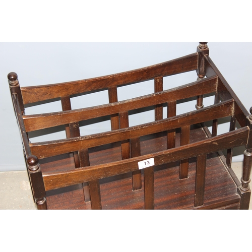 13 - Antique style canterbury magazine rack with single drawer, standing on brass castors, approx 56cm wi... 