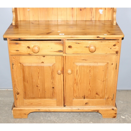 14 - A modern pine slim country kitchen dresser, 2 drawers over 2 cupboards, approx 97cm wide x 185cm tal... 