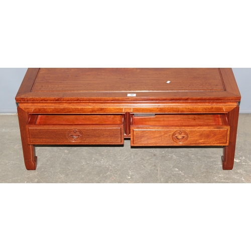 17 - A 20th century Chinese hardwood coffee or low table with 2 drawers, approx 102cm wide x 41cm tall x ... 