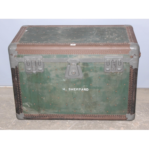 21 - A large vintage green shipping trunk with flat top, locked and with no key, approx 97cm wide x 55cm ... 