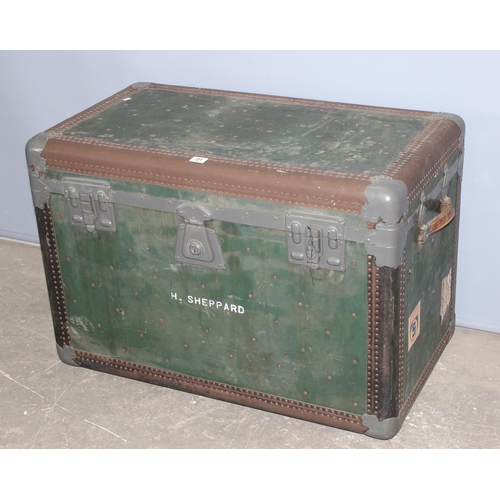 21 - A large vintage green shipping trunk with flat top, locked and with no key, approx 97cm wide x 55cm ... 