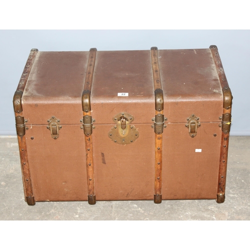 22 - A large vintage canvas and wooden shipping trunk with flat top, approx 79cm wide x 49cm deep x 50cm ... 