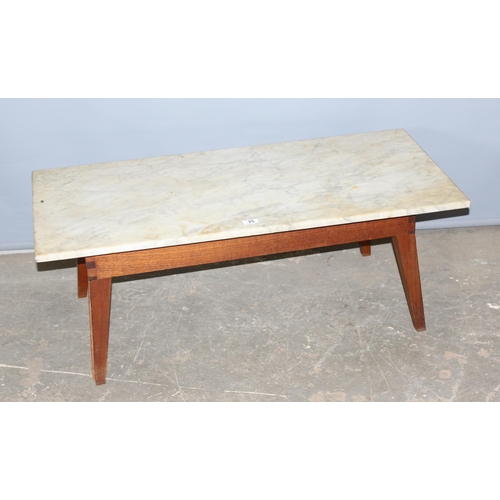 25 - A small marble topped low table, approx 107cm x 51cm