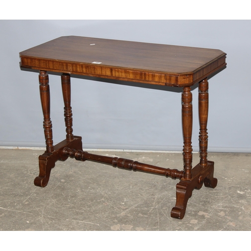 38 - An antique mahogany side table with turned legs, approx 88cm x 43cm