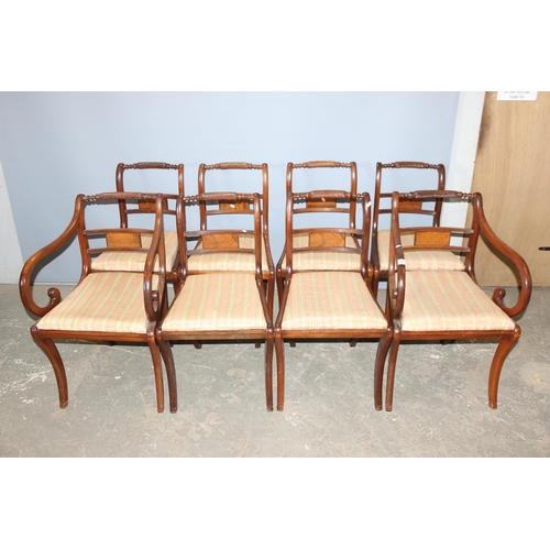 39 - A set of 8 Regency style sabre legged dining chairs with turned rail backs