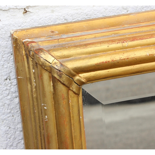 400 - An extremely large gilt framed wall mirror, approx 230cm x 90cm