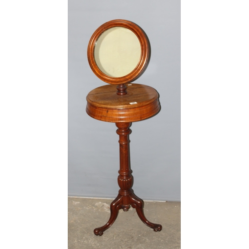 48 - A 19th-century walnut gentleman's shaving/vanity stand, having adjustable circular plain plate mirro... 