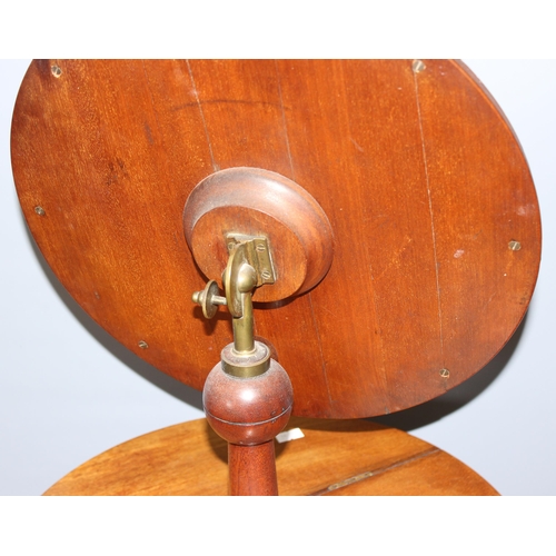 48 - A 19th-century walnut gentleman's shaving/vanity stand, having adjustable circular plain plate mirro... 