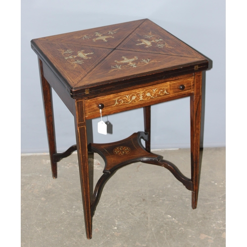 5 - A late Victorian or Edwardian Rosewood and Marquetry-Inlaid Envelope Card Table c.1900, with four pi... 