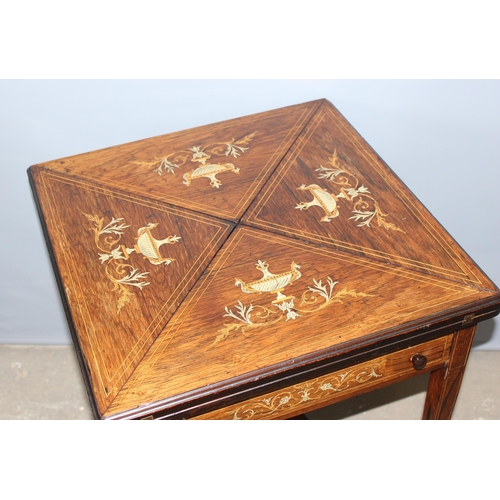 5 - A late Victorian or Edwardian Rosewood and Marquetry-Inlaid Envelope Card Table c.1900, with four pi... 