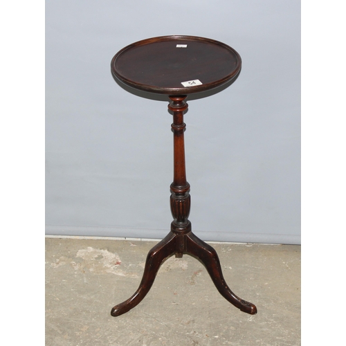 54 - A 19th century mahogany wine table, approx 28cm in diameter