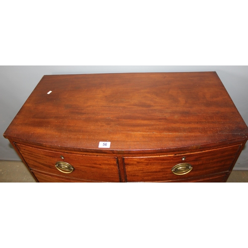 56 - A Georgian mahogany 2 over 2 chest of drawers standing on bracket feet, with round brass handles, ap... 