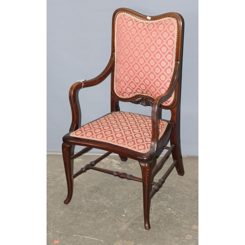 59 - An antique mahogany bedroom chair with carved details and strung inlay, likely Edwardian