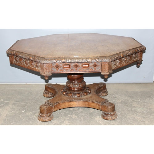 64 - An extremely impressive late 19th century Victorian oak Gothic Revival, octagonal library table, wit... 