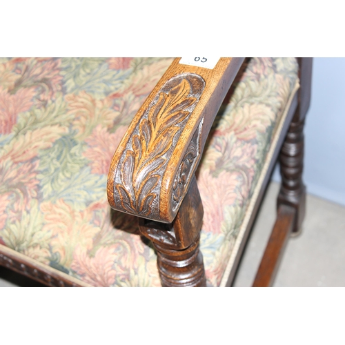 65 - A set of 5 19th century Carolean style oak chairs, 4 dining and one high backed carver with profusel... 