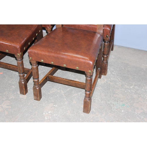 66 - A set of 6 Arts & Crafts period oak dining chairs with studded leather or leatherette seats