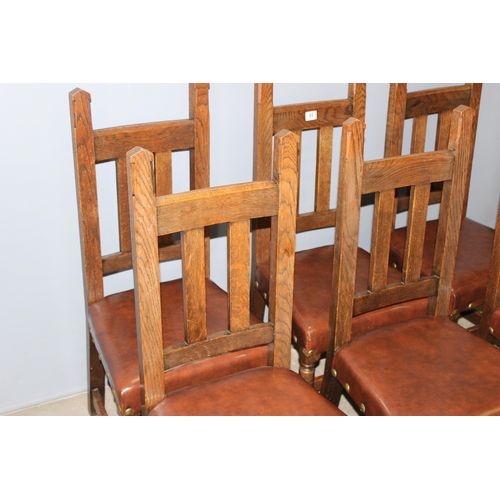 66 - A set of 6 Arts & Crafts period oak dining chairs with studded leather or leatherette seats