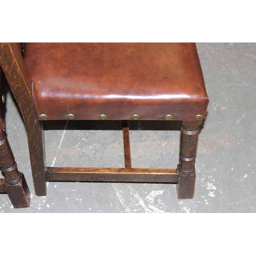 66 - A set of 6 Arts & Crafts period oak dining chairs with studded leather or leatherette seats