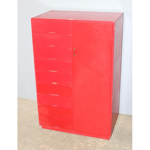 7 - A retro red painted small 9 drawer gentleman's wardrobe or dressing chest, seemingly unmarked, appro... 